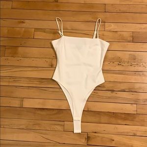 Off white bodysuit with adjustable strap